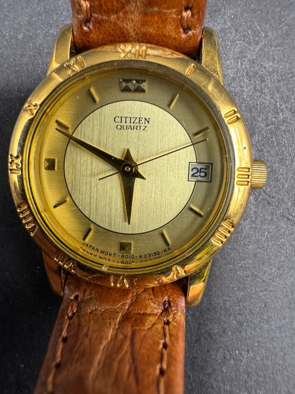 Citizen Watch Women 24mm Champagne Dial Gold Tone Date 6010-K06878 Brown Band